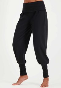 Urban Goddess DEVI YOGA - Tygbyxor - urban black