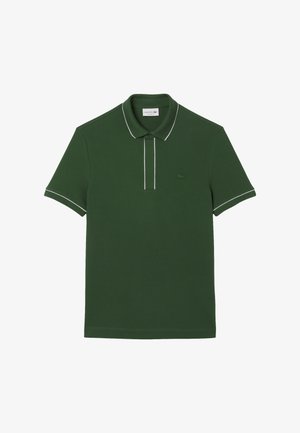 Donkergroen poloshirt van katoen, met een contrasterende witte bies langs de kraag en de knopenlijst, voorzien van een geborduurd logo.