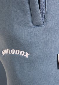 Smilodox MERRICK - Træningsbukser - blau