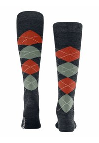 Calze al ginocchio di colore grigio scuro con un motivo argyle a rombi in rosso e verde. Realizzate in un materiale morbido con dettagli di cucitura bianca a contrasto.