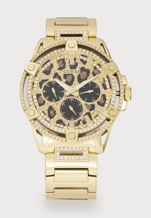 Orologio in metallo dorato con quadrante a stampa leopardata, accenti di cristallo, tre sottodial neri e un bracciale in oro lucido.