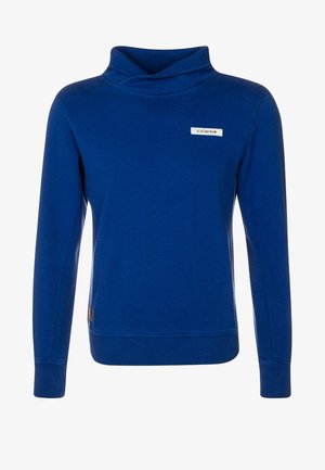 Niebieska bluza z golfem, długimi rękawami i małym logo na piersi. Wykonana z miękkiego materiału o gładkiej fakturze.