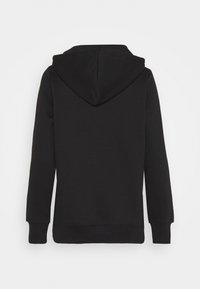 Hoodie noir à manches longues avec poignets et ourlet côtelés, montré de dos sur un fond blanc uni.