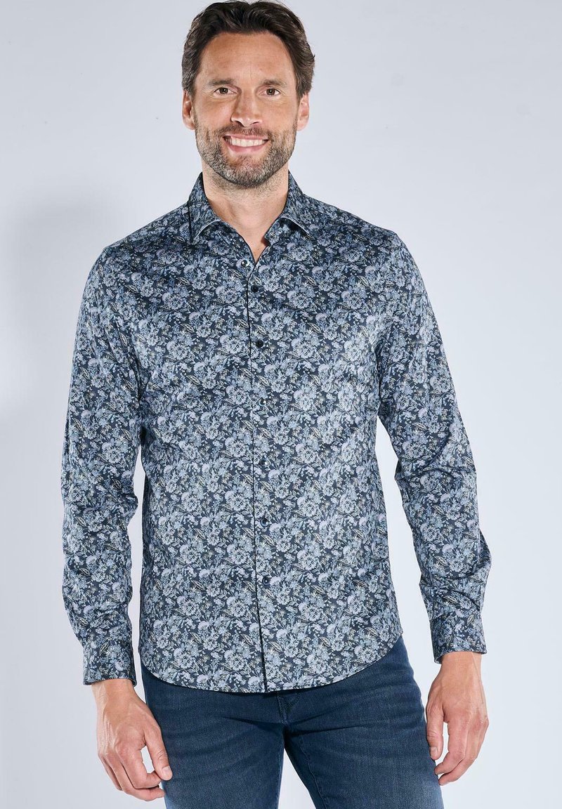 Langarmhemd in Dunkelblau mit blumenmuster in Hellblau und Weiß. Verfügt über einen Button-Down-Kragen und einen regulären Schnitt. Glatte Stofftextur.