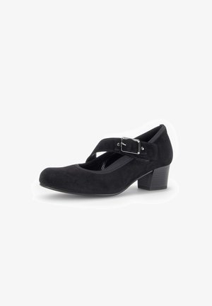 Chaussure Mary Jane en daim noir à talon bas, bout arrondi et large bride ajustable avec une boucle argentée.