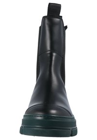 Black leather ankle boot with a smooth finish, elastic side panels, and a green rubber sole. Features a pull tab for easy wear.