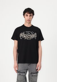 Guess - FLOWER TEE - Marškinėliai su spaudiniu - jet black Miniatiūros vaizdas 1
