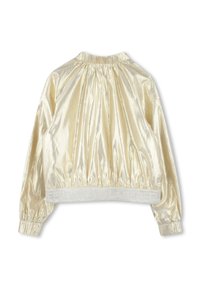 Veste en satin doré avec un col froncé, des poignets côtelés et une taille texturée ornée d'incriptions en relief.