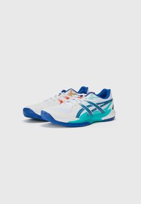White athletic shoes with blue accents, featuring a breathable mesh upper, multi-colored detailing, and a textured rubber sole for grip.
