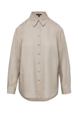 Beżowa koszula zapinana na guziki, wykonana z lekkiego materiału. Posiada klasyczny kołnierzyk, długie rękawy oraz prosty krój z zaokrąglonym dołem.