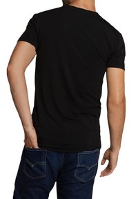 T-shirt nero a maniche corte con scollatura rotonda, realizzato in tessuto morbido, design aderente e retro senza cuciture. Nessun motivo o accento visibile.