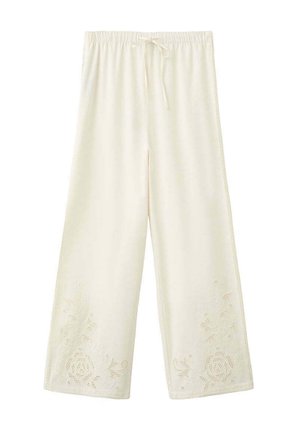Pantalon large crème avec taille élastique, cordon de serrage et broderie en dentelle florale près des ourlets.