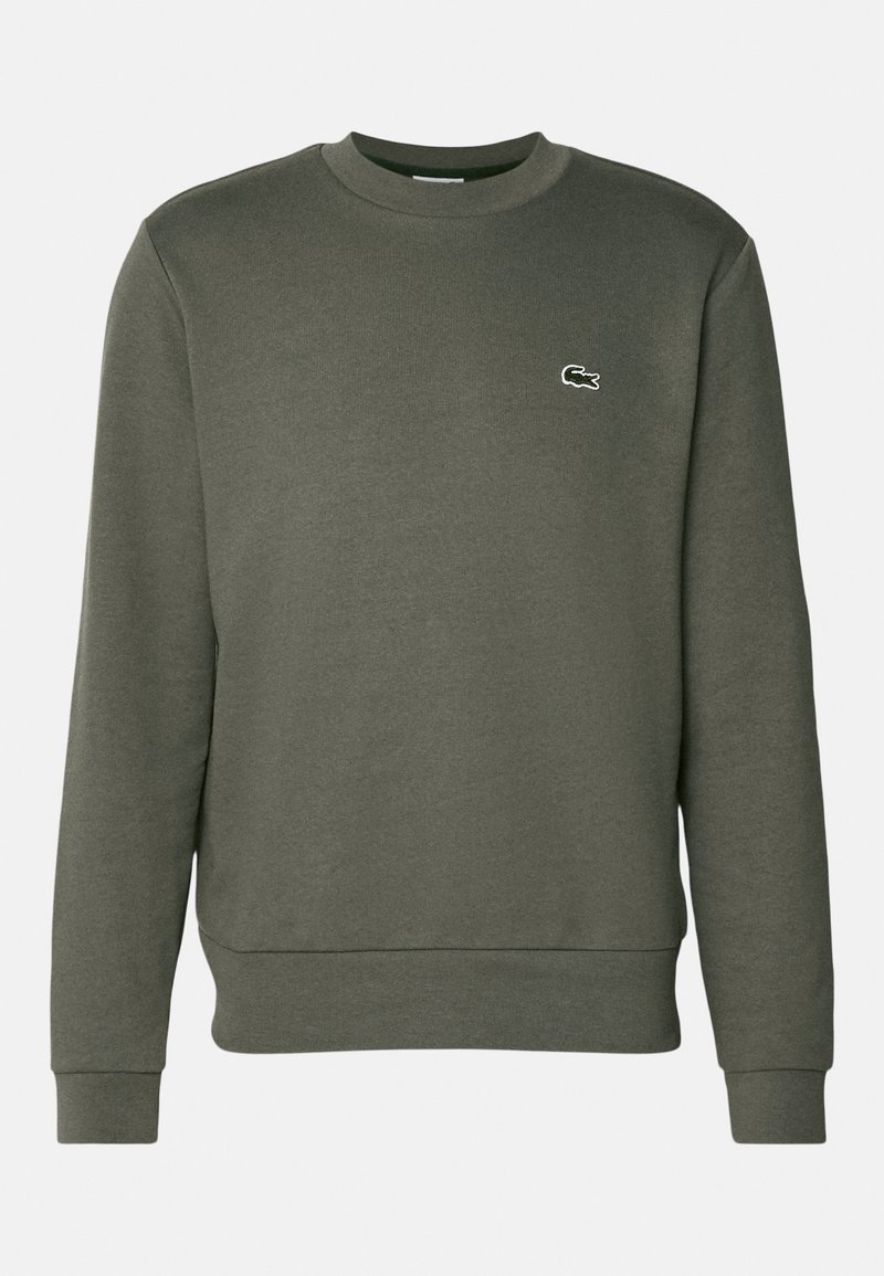 Donkergroen sweatshirt van zacht materiaal, voorzien van een ronde halslijn en geribbelde manchetten. Een klein wit logo bevindt zich op de linkerborst.