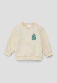 Beżowy bawełniany sweter z okrągłym dekoltem, ściągaczami na rękawach oraz aplikacją przedstawiającą choinkę Bożonarodzeniową z gwiazdką, sercami i wzorem doniczki.
