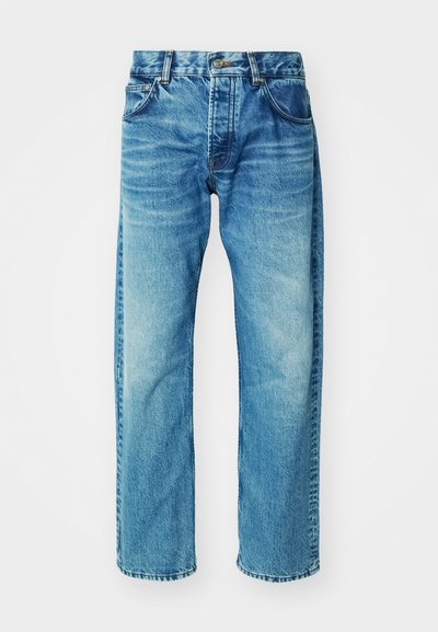 Sinine denimist valmistatud teksad, millel on mugav lõige, viis taskut, nööbiga sulgur ja õrn fadeering koos kergelt kulunud servaga.