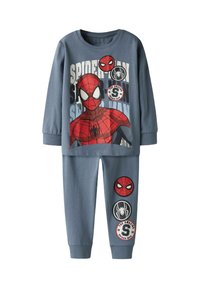 Zili zila kokvilnas pidžamas komplekts, kas sastāv no garām piedurknēm topa ar Spider-Man grafiku un biksēm ar trim izšūtām aplikācijām, tostarp zirneklis un logo dizainiem.