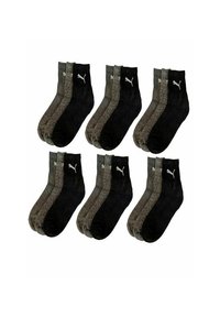 Sechs Paar schwarze und graue Knöchelsocken mit einem weißen Puma-Logo, in zwei Reihen auf einem weißen Hintergrund angeordnet.
