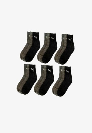 Six pairs of black and gray ankle socks with a white Puma logo displayed in two rows on a white background.