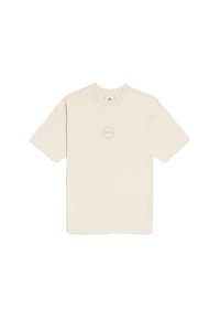 T-shirt en coton beige à manches courtes, col rond, avec un logo circulaire de couleur marron clair au centre. Design simple et coupe décontractée.