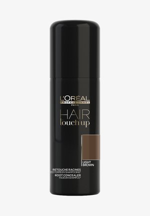 Spray can nero cilindrico con testo dorato. L'etichetta mostra "L’Oréal Professionnel Hair Touch Up" e un campione di colore etichettato "Marrone chiaro."