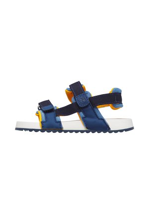 Blue and yellow open-toe sports sandal with adjustable straps and a white sole, shown from the side on a white background.
