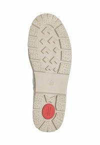 Semelle de chaussure en caoutchouc blanc avec un motif de bande de roulement texturé et un détail circulaire rouge. Taille marquée comme 37. Construction durable pour une bonne traction.