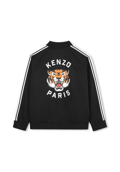 Giacca nera con una grande grafica di una tigre arancione e il testo "KENZO PARIS" sul retro. Strisce bianche lungo le maniche. Tessuto morbido.