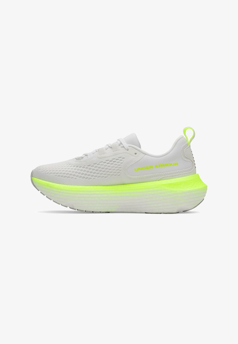 White athletic shoe with mesh upper, neon yellow accent on the outsole, textured design, and minimalist lace closure.