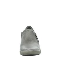 Grey leather slip-on shoe with a smooth texture, rounded toe, and side zipper detail. Rubber sole, minimalist design.