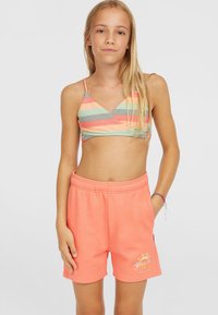 Ribakujuline bralette pastelltoonides ja oranžid puuvillased lühikesed püksid, millel on päikesegraafik, elastne vöökoht ja küljetaskud.