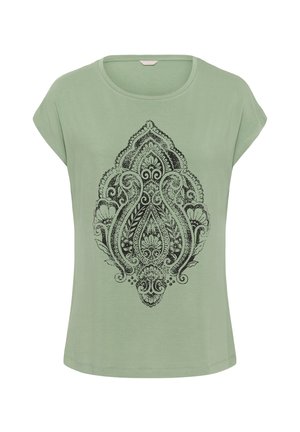 Chemise vert clair à manches courtes avec encolure ronde et grand motif floral et cachemire noir complexe centré sur le devant.