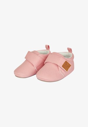 Pink fabric baby shoes with a soft sole, velcro strap, and a brown leather patch featuring a bunny design. Rounded toe shape.