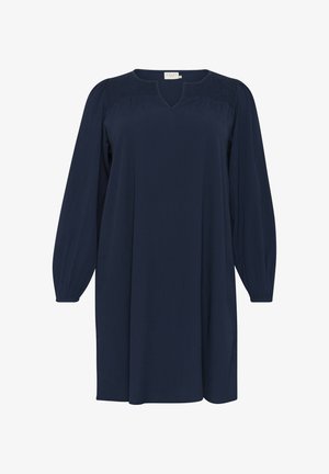 Tengerészkék ruha hosszú puffos ujjakkal, V-kivágással és ráncolt részletekkel a vállaknál. Simább, könnyű anyag, laza fazonnal.