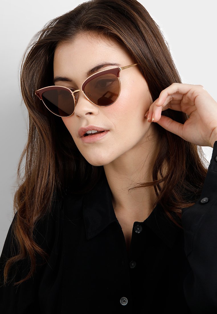Prada Sonnenbrille rose goldbordeaux Prada Sonnenbrille rose goldbordeaux