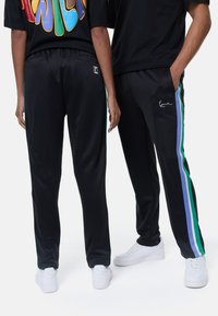 Karl Kani SMALL SIGNATURE STRAIGHT LEG TRACKPANTS UNISEX - Donji dijelovi trenirke - black