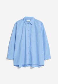 Light blue button-up shirt with a pointed collar, long sleeves, and a chest pocket. Made of smooth fabric with a relaxed fit.
