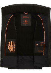 Intérieur de la veste noire avec des accents orange. Doublure en polaire douce, deux poches latérales avec logo. Fermeture éclair et une étiquette avec les détails de la marque.