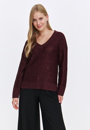 - Sweter