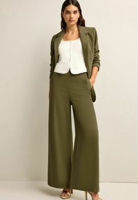 Next SUPER WIDE  - Kelnės - khaki green