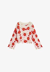 Suéter de ganchillo en color crema con patrones de flores rojas y rosas. Presenta mangas largas acampanadas y un dobladillo con forma de concha. Material de punto texturizado.