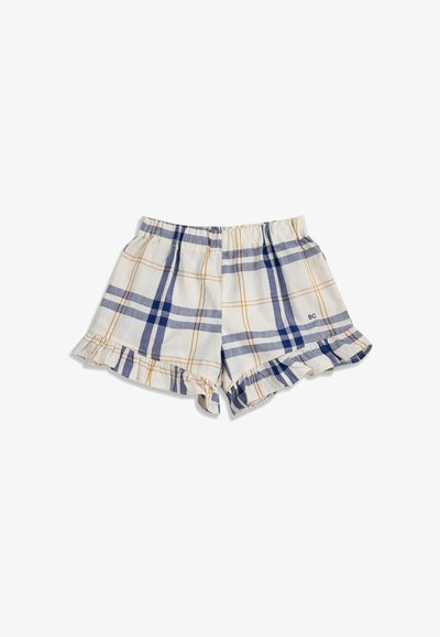 Shorts blancs à motif écossais bleu et orange, taille élastique et ourlets volantés, avec une petite broderie "BC" sur la jambe droite.