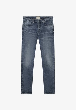 Dżinsy w ciemnoniebieskim kolorze z przecieranym wykończeniem, pięcioma kieszeniami i prostym krojem nogawek. Posiadają subtelną nitkę i metalowe detale.