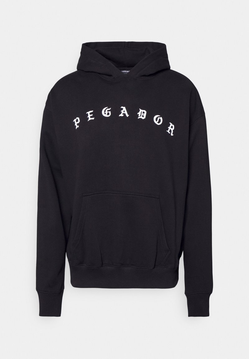 Sweat à capuche noir avec une poche avant, des poignets côtelés, et le mot "PEGADOR" en lettres blanches majuscules sur la poitrine.