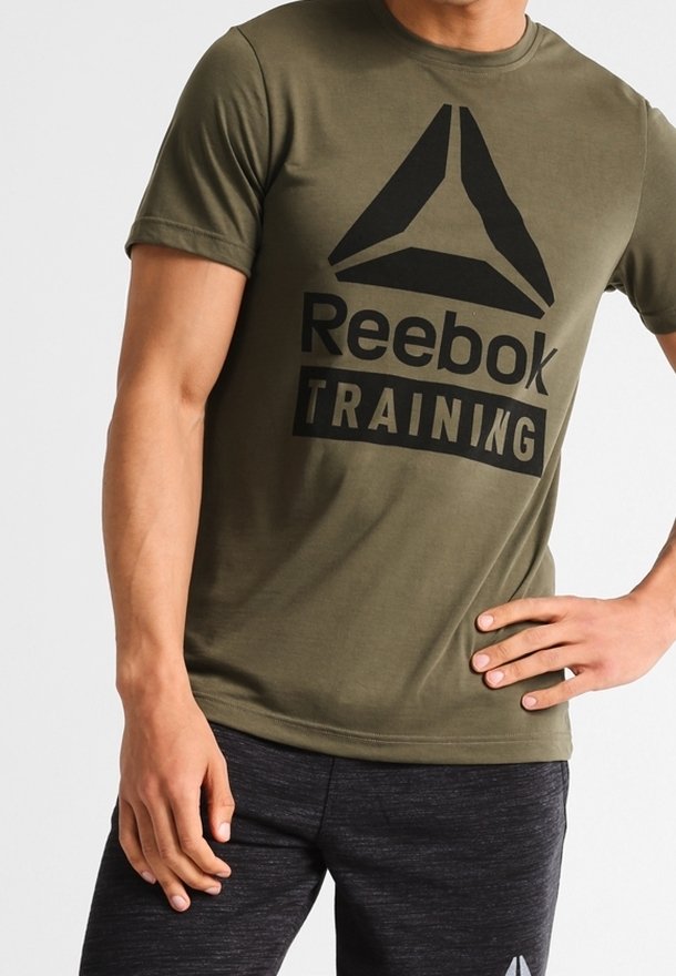Olive green Reebok training t-shirt with a black logo featuring a triangle and bold text. Short sleeves, crew neckline, cotton blend fabric.