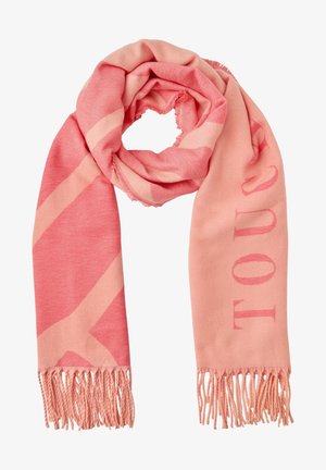 Roze sjaal gemaakt van zachte stof, met een abstract ontwerp van lichtere roze strepen en gefranjerde randen. Tekst: "TOUCH" in een vet lettertype.