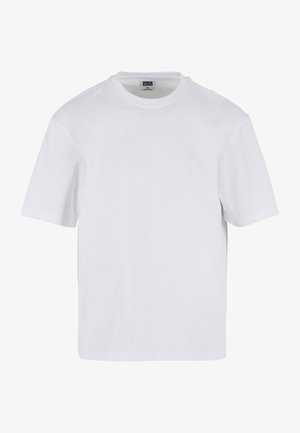 Hvitt kortermet t-skjorte laget av bomull. Har rund hals og en avslappet passform. Glatt tekstur, minimalistisk design, uten mønstre eller detaljer.