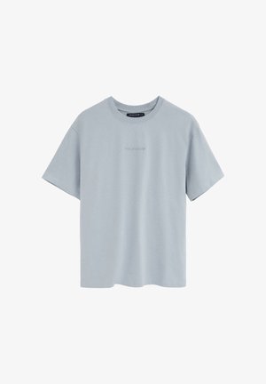 Jasnoszary t-shirt z krótkim rękawem i okrągłym dekoltem, z subtelnym haftowanym logo "Polo Club" na środku przodu.