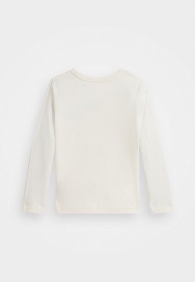 Dlhý rukáv, top s okrúhlym výstrihom v nebeskej bielej farbe z bavlny. Hladká textúra s voľným strihom a bez viditeľných vzorov alebo akcentov.