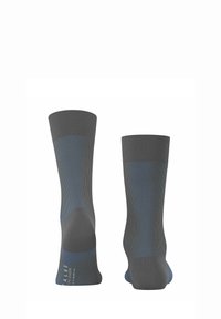 Graue Socken mit geripptem Muster und blauen Akzenten. Verfügen über verstärkte Fersen- und Zehenbereiche. Einfaches Design, geeignet für verschiedene Anlässe.