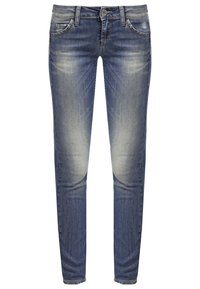 Jeans de denim azul ajustados con desvanecimiento en los muslos, cuatro bolsillos, cierre de botón y cremallera, y dobladillo cosido.